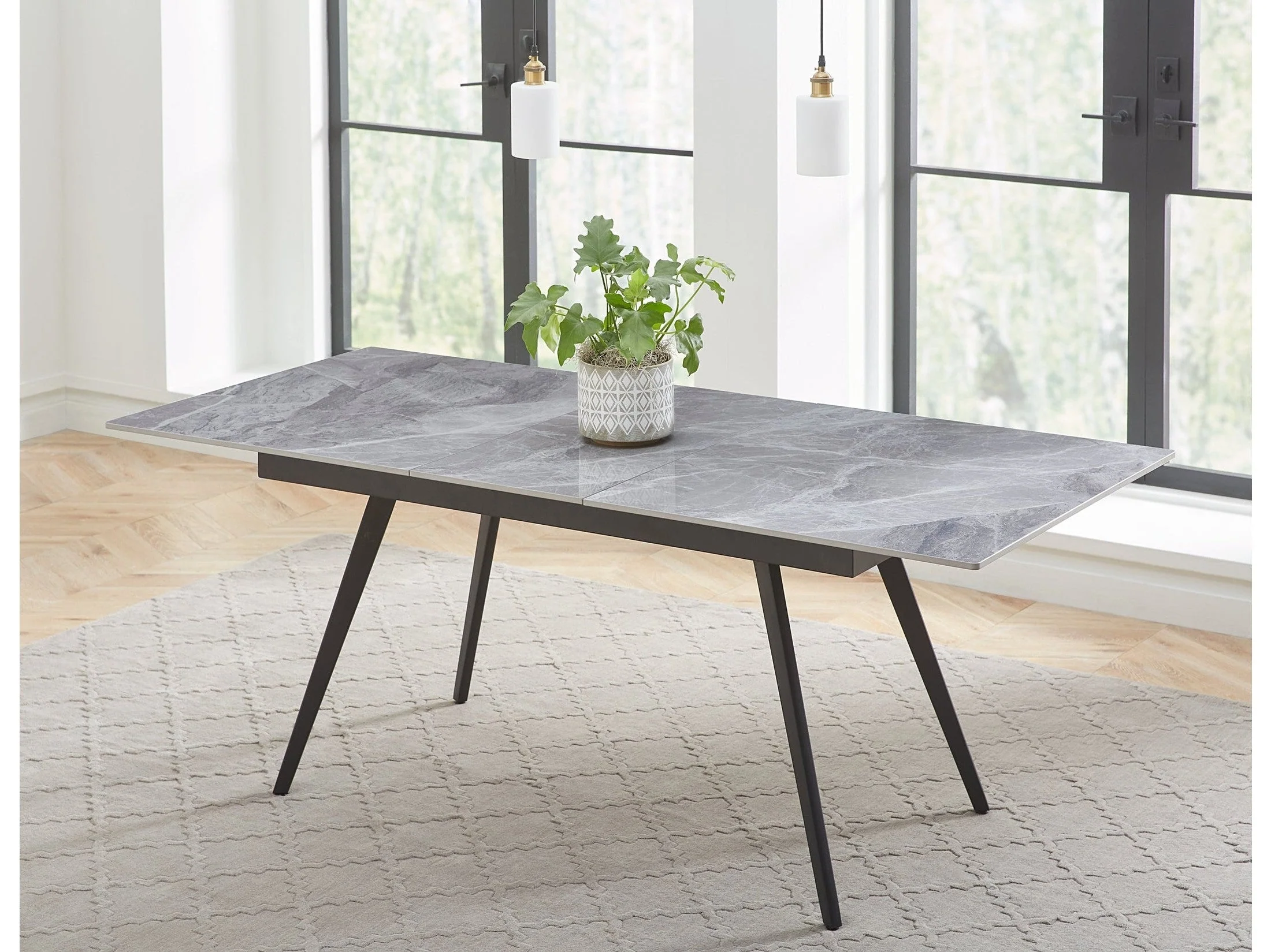 Lucia Extendable Stone Top Metal Leg Dining Table in Piedra and Black